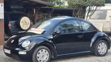 VOLKSWAGEN New Beetle
