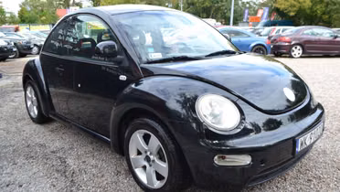 VOLKSWAGEN New Beetle