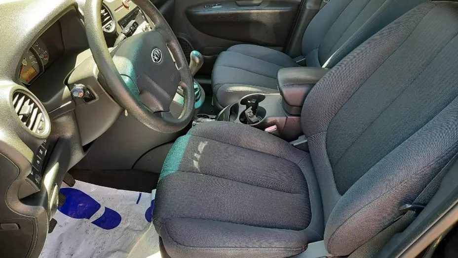 KIA Carens -
