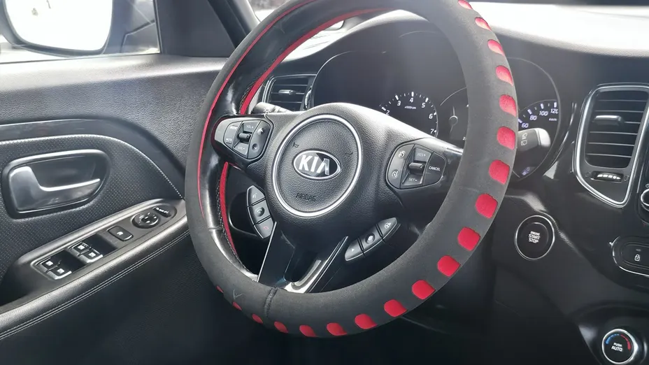 KIA Carens -