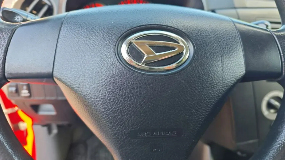 DAIHATSU Cuore -